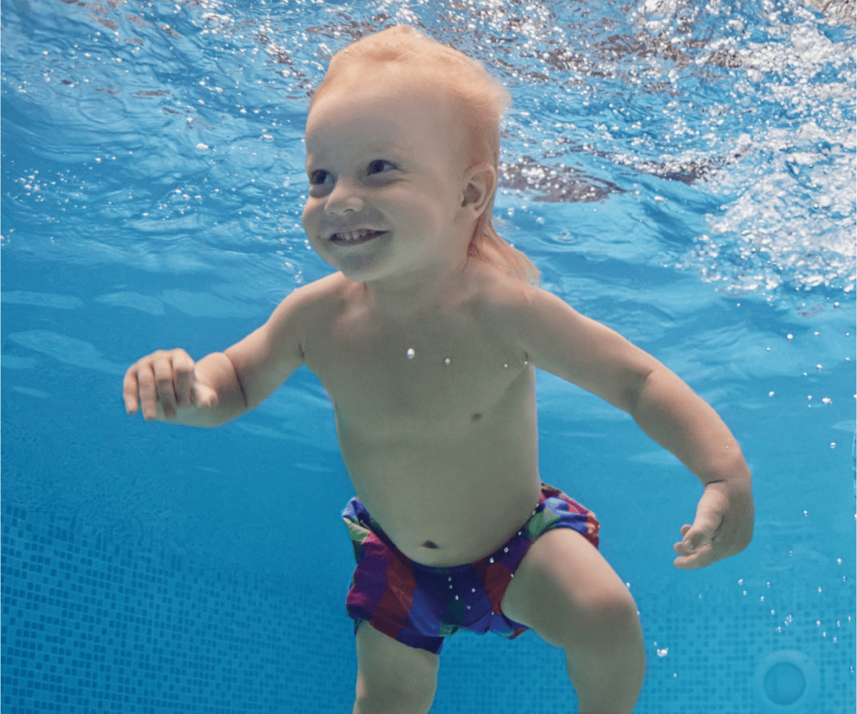 stock photo of kid swimming